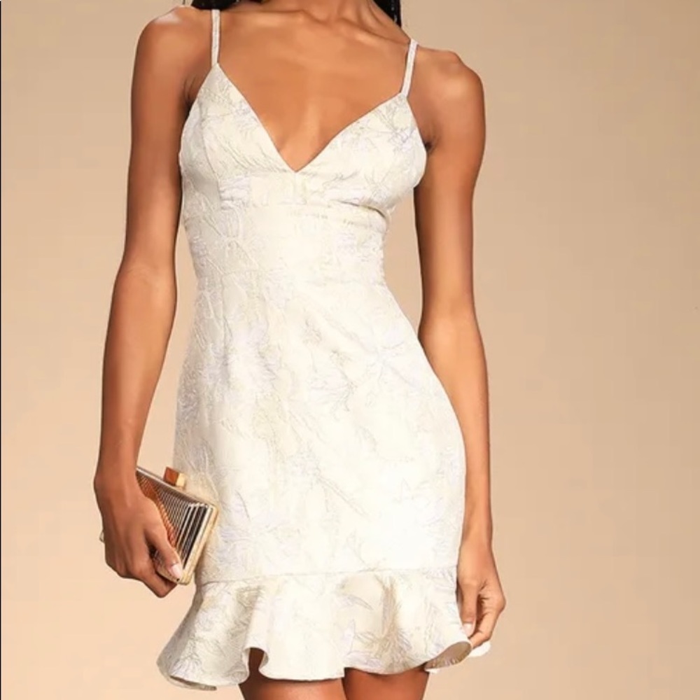 Never worn Cream Trumpet Mini Dress